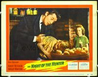 5f726 NIGHT OF THE HUNTER LC#4 '55 close up of Robert Mitchum threatening Billy Chapin with knife!