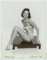 5j025 ANGIE DICKINSON 8x10 still '58 seated portrait smiling in very sexy swimsuit on small table!