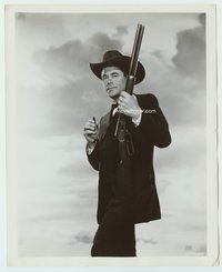 5j185 GLENN FORD 8x10 still '50s portrait standing full-length holding rifle & cigar in hand!