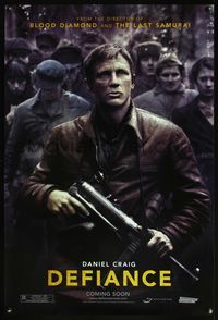 5m281 DEFIANCE DS teaser 1sh '08 Edward Zwick directed, rugged Daniel Craig w/machine gun!