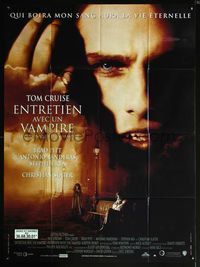 5n487 INTERVIEW WITH THE VAMPIRE French 1p '94 close up of fanged Tom Cruise, Brad Pitt, Anne Rice