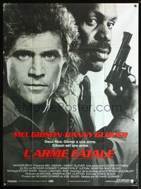 5n525 LETHAL WEAPON French 1p '87 great close image of cop partners Mel Gibson & Danny Glover!