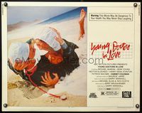 5s697 YOUNG DOCTORS IN LOVE 1/2sh '82 doctors McKean & Sean Young in scrubs kissing on beach!