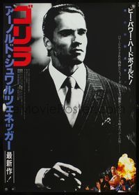 5w343 RAW DEAL black & white Japanese '86 close up of tough Arnold Schwarzenegger in suit w/cigar!