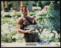 6f012 COMMANDO color signed 11x14 still #7 '85 by Arnold Schwarzenegger, close up with assault rifle