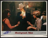 6f022 HONKYTONK MAN signed LC #1 '82 by Clint Eastwood, who's wearing a cowboy hat & lighting a cig!