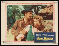 6f659 ROCKY MOUNTAIN LC #7 '50 close up of cowboy Errol Flynn with hand over Patrice Wymore's mouth