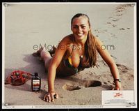 6f753 TOP SECRET LC #5 '84 Zucker Bros., wacky image of girl leaving boob prints in sand on beach!