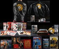 6m010 JAMES BOND BOX 36 miscellaneous items '80s-90s cool jacket, magazines, handcuffs & more!