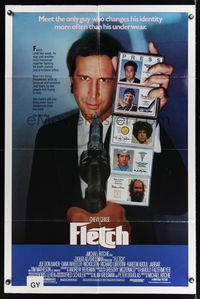 7d311 FLETCH 1sh '85 Michael Ritchie, wacky detective Chevy Chase has gun pulled on him!