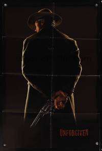 7e938 UNFORGIVEN teaser 1sh '92 classic image of gunslinger Clint Eastwood with his back turned!