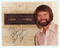 7f151 GLEN CAMPBELL signed color repro 8x10 '80s portrait standing by nameplate on door!