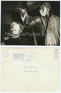 7h057 FAUST German 8x10.75 still '26 F.W. Murnau, Emil Jannings as the Devil giving food to Ekman!