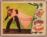 7r136 ARSENIC & OLD LACE LC '44 c/u of scared Cary Grant carrying Priscilla Lane, Frank Capra