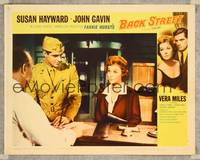 7r144 BACK STREET LC #8 '61 soldier John Gavin eyeing sexy Susan Hayward at counter!