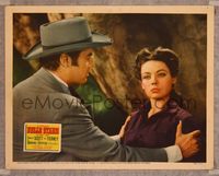 7r157 BELLE STARR LC '41 great close up of Shepperd holding sexiest female outlaw Gene Tierney!