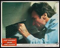 7r272 ESCAPE FROM ALCATRAZ LC #5 '79 super close up of Clint Eastwood passing notes in prison!