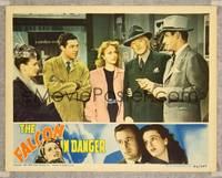 7r277 FALCON IN DANGER LC '43 detective Tom Conway shows two men & two women the important clue!