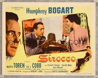 7r706 SIROCCO LC '51 close up of Humphrey Bogart examining Marta Toren's bracelet!