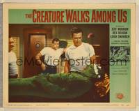 8b068 CREATURE WALKS AMONG US LC #8 '56 three guys watch wounded monster laying on table!