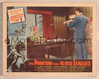 8b119 PHANTOM FROM 10,000 LEAGUES LC #2 '56 man points speargun at woman sitting at desk!