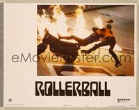 8b127 ROLLERBALL  LC #6 '75 cool image of guy being pulled off motorcycle on flaming track!
