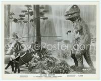 8d349 LAND UNKNOWN 8x10 still '57 great special effects image of men shooting at phony dinosaur!