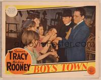 8j095 BOYS TOWN LC '38 Spencer Tracy as Father Flannagan handcuffs boys to make them stay!