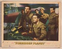 8j286 FORBIDDEN PLANET LC #3 '56 Leslie Nielsen at controls of spaceship with crew behind him!