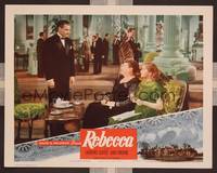 8j643 REBECCA LC R50s Alfred Hitchcock, Laurence Olivier stares at Joan Fontaine on couch!