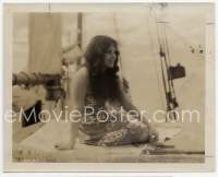 9g341 PAGAN 8x10 still '29 close up of sexy Renee Adoree in sarong resting while on ship!
