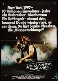 9j244 ESCAPE FROM NEW YORK German '81 John Carpenter, cool image of Kurt Russell w/rifle!