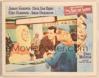 9k162 ART OF LOVE LC #5 '65 James Garner & pretty Angie Dickinson at airport ticket counter!