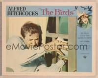 9k174 BIRDS LC #6 '63 Hitchcock, close up of Rod Taylor trying to step them from coming in window!