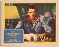 9k328 MACOMBER AFFAIR LC #4 '47 close up of intense Gregory Peck seated at table, Hemingway