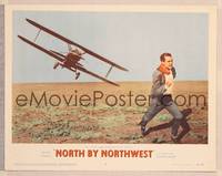 9k356 NORTH BY NORTHWEST LC #2 '59 Alfred Hitchcock, classic image of Cary Grant chased by plane!