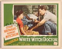 9k510 WHITE WITCH DOCTOR LC #3 '53 Susan Hayward watches Robert Mitchum give water to patient!
