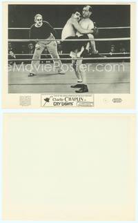 9y090 CITY LIGHTS English 8x10 FOH LC R50s c/u of boxer Charlie Chaplin in his opponents arms!