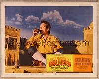 1d150 3 WORLDS OF GULLIVER LC '60 Ray Harryhausen, giant Kerwin Mathews sits in castle walls!