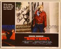 1d022 EYE FOR AN EYE signed LC #6 '81 by Chuck Norris, who's close up in really outdated jacket!