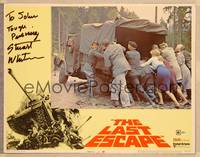 1d031 LAST ESCAPE signed LC #2 '70 by Stuart Whitman, who's helping people push truck out of mud!