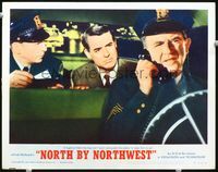 1d417 NORTH BY NORTHWEST LC #8 R66 Cary Grant in back of police car wants to go to jail, Hitchcock