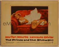 1d453 PRINCE & THE SHOWGIRL LC #6 '57 sexy Marilyn Monroe smiling on red couch in feathers!