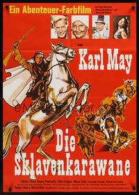1s217 DIE SKLAVENKARAWANE German '58 Viktro Staal, art of man on horseback w/rifle!