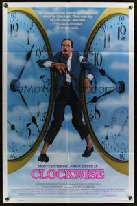1y140 CLOCKWISE 1sh '86 great image of wacky John Cleese trapped between clocks!