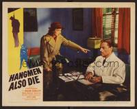 1z346 HANGMEN ALSO DIE LC '43 directed by Fritz Lang, Anna Lee points at Brian Donlevy at desk!