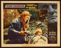 1z412 LONELY ARE THE BRAVE LC #1 '62 close up of Kirk Douglas holding gun & rifle over fallen man!