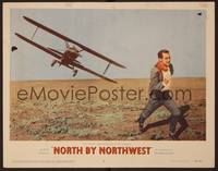 1z465 NORTH BY NORTHWEST LC #2 '59 Alfred Hitchcock, classic image of Cary Grant chased by plane!