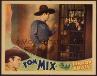 1z604 TERROR TRAIL LC '33 great close up of Tom Mix standing before bad guy in jail cell!