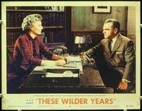 1z610 THESE WILDER YEARS LC #4 '56 James Cagney & Barbara Stanwyck at desk in major staredown!